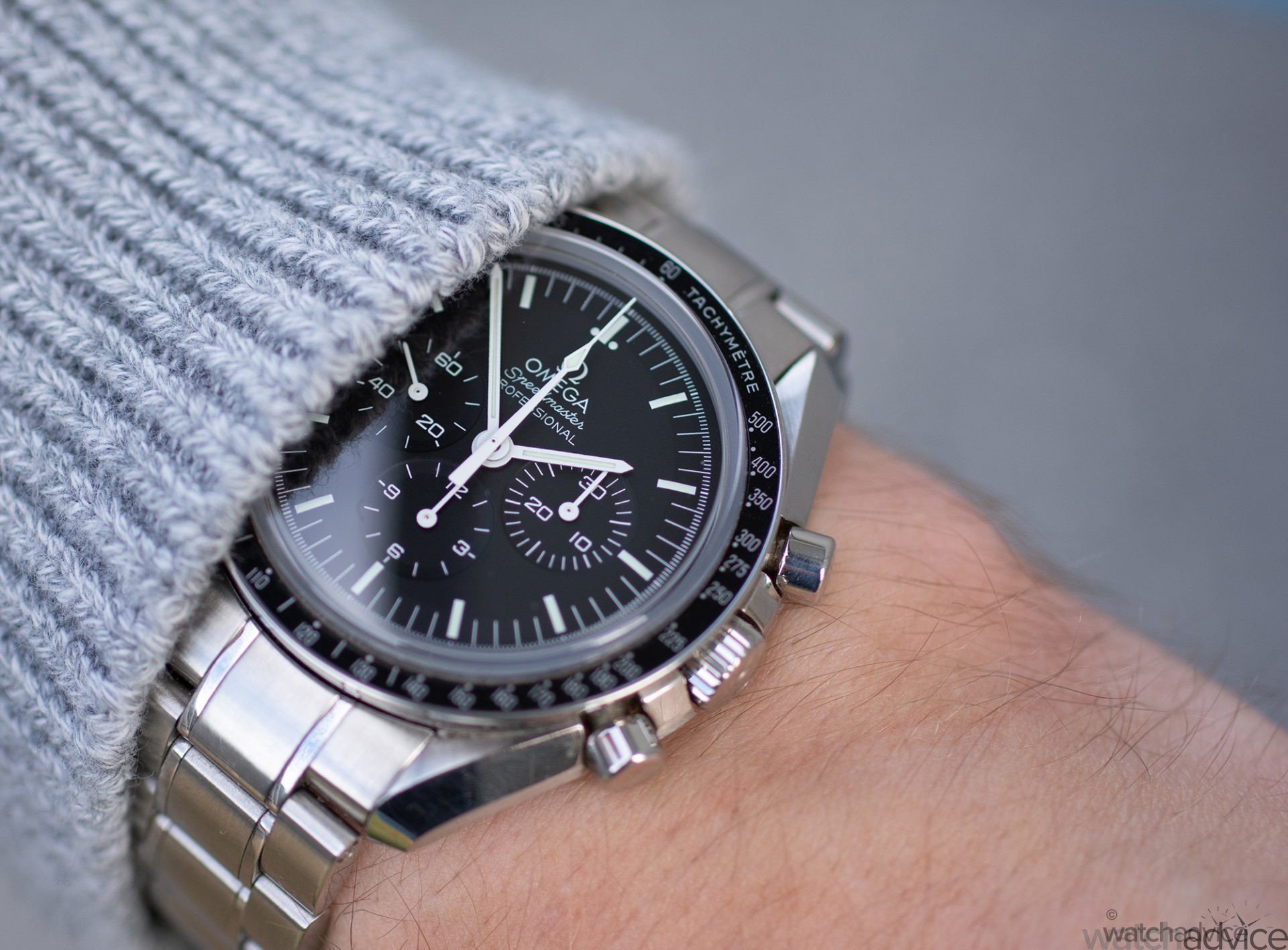 moonwatch on wrist
